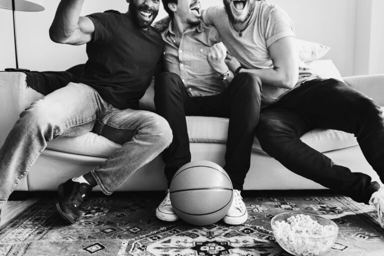 Friends watching basketball